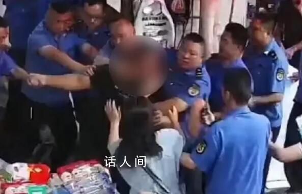 城管被指鎖喉拖拽執(zhí)法 官方回應(yīng)